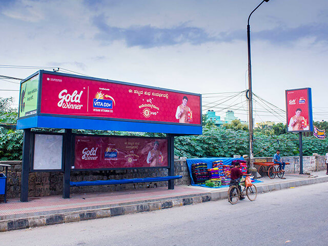 Bangalore city bus wrapped with Times OOH advertisement, showcasing creative outdoor advertising in urban transit.
